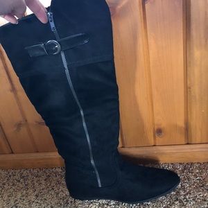 Black knee high boot